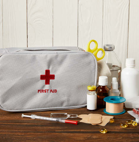 close up shot of first aid kit with various medicines