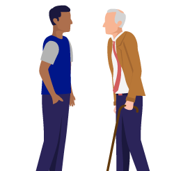 konvoy specialist talking to older man