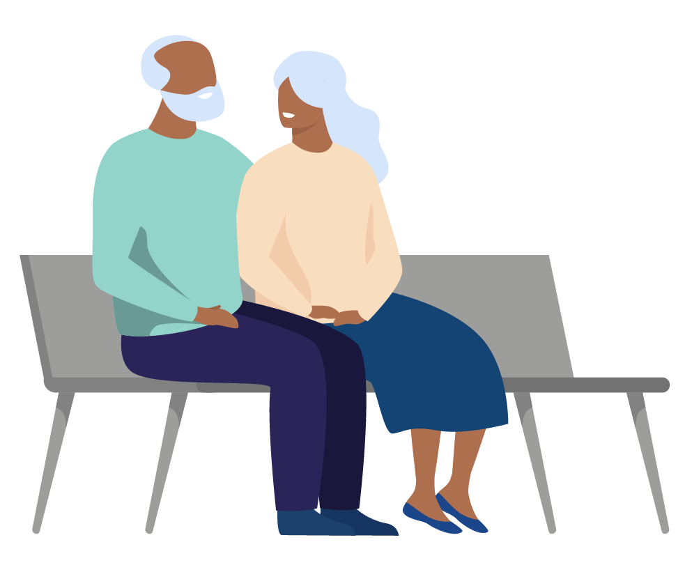elderly couple sitting on bench